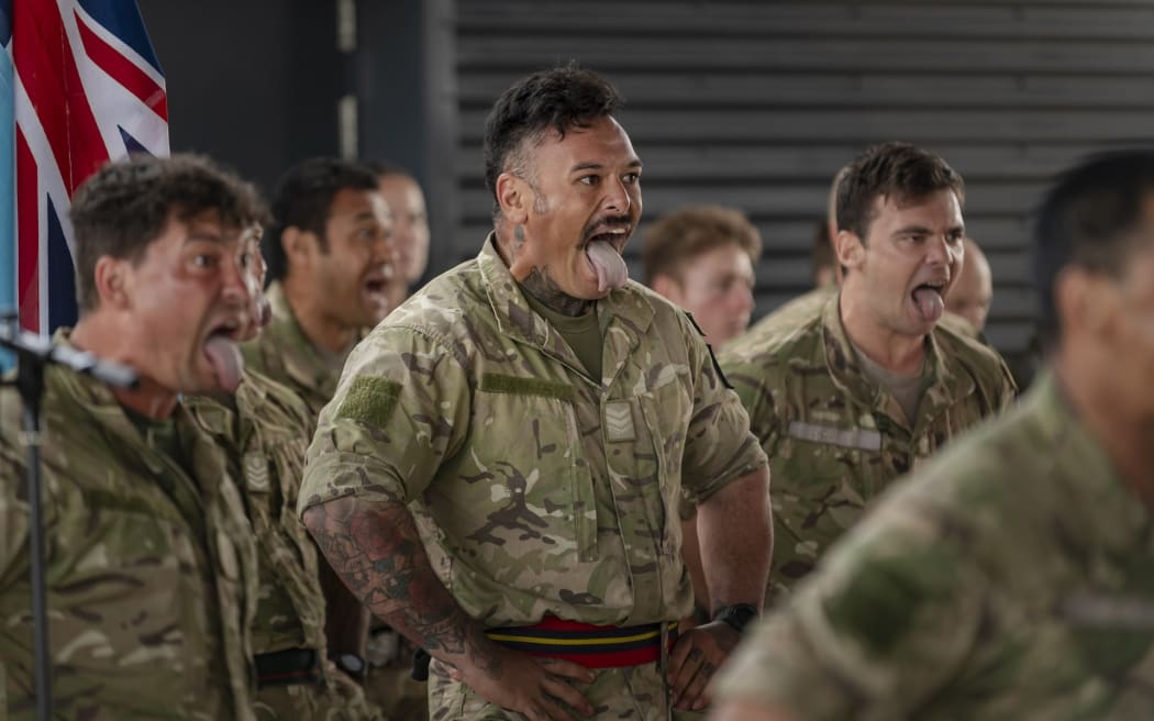A soldier from 16th Field Regiment, Royal Regiment of New Zealand Artillery performing a haka at the Exercise Cartwheel closing ceremony