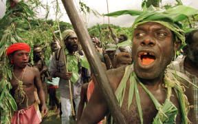 Resistance fighters and guerillas from the Bougainville Revolutionary Army (BRA) arrive at the signing of the Bougainville Cease-fire Agreement in Arawa on Bougainville 30 April.