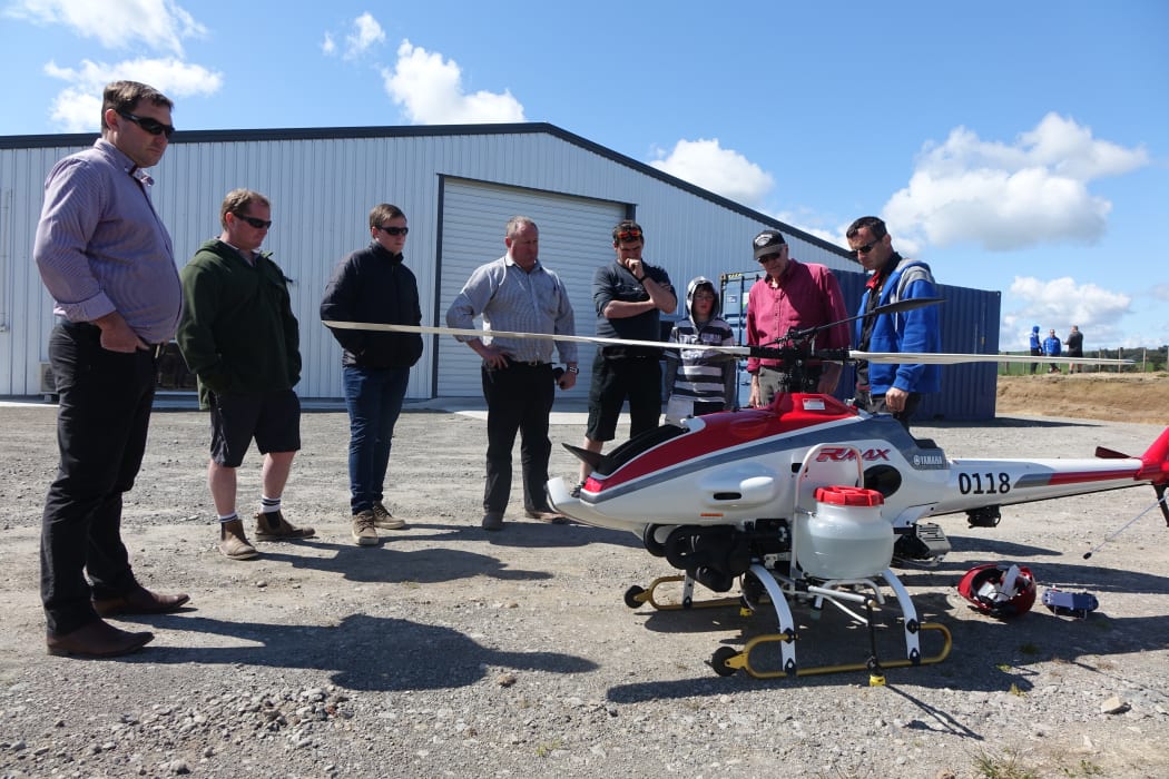 A group of curious farmers, spraying contractors and radio-controlled aircraft enthusiasts turned out in Lepperton to see the Yamaha RMAX put through its paces.