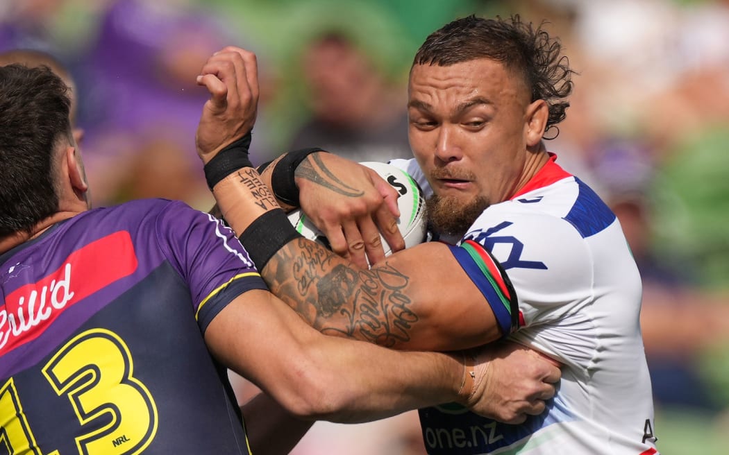 James Fisher-Harris of the Warriors is tackled during the Telstra NRL Premiership match between the NZ Warriors and the Melbourne Storm.