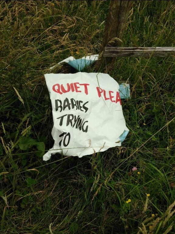 A protest sign at the club which was destroyed.