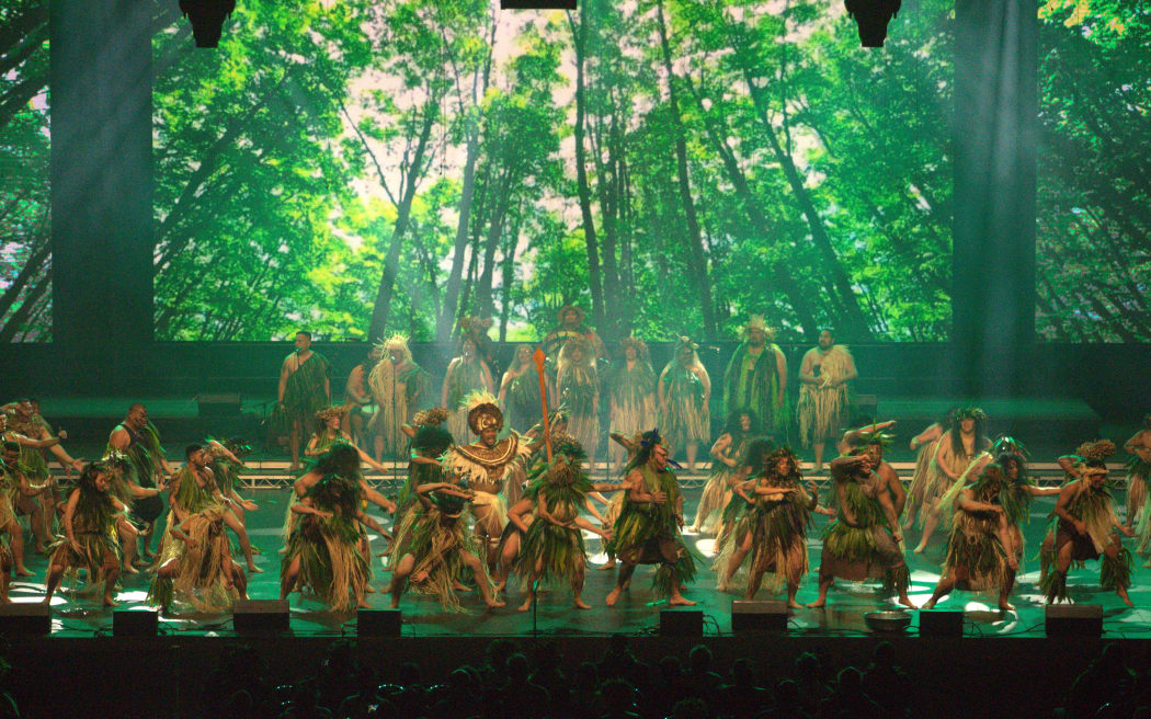 Performers give their all to a pe'e - traditional chant showcase.