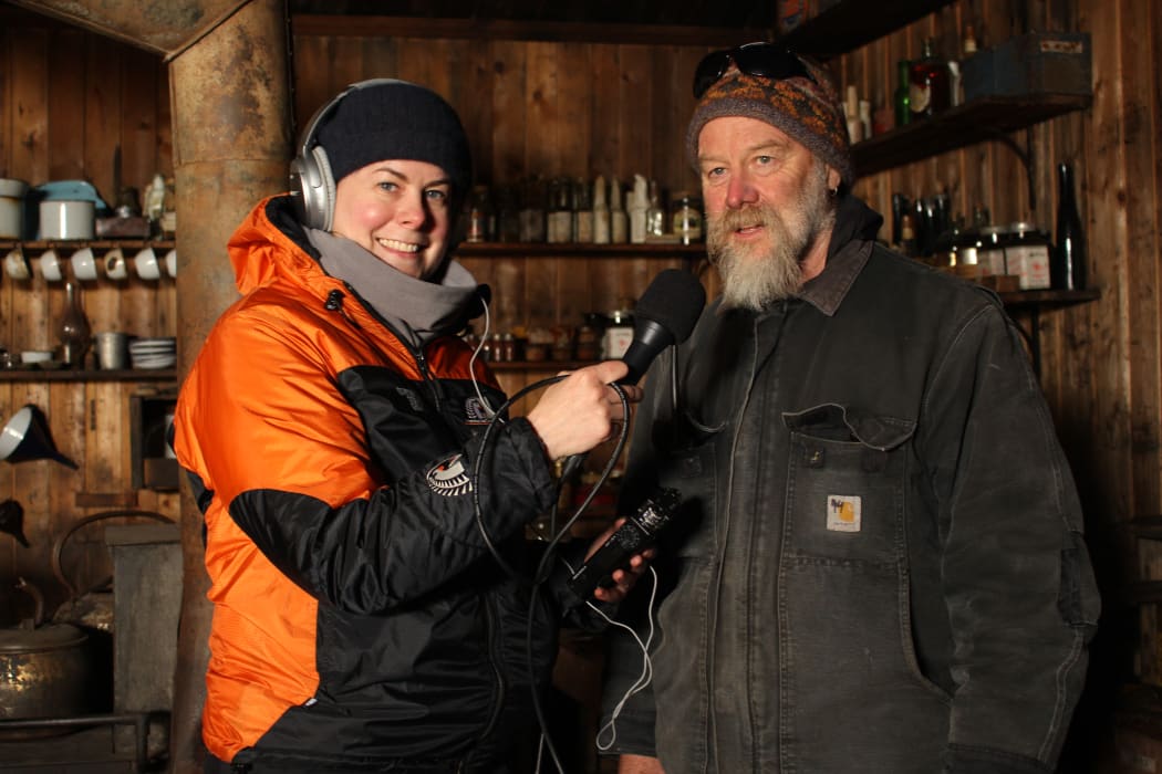 Francesca Eathorne and Al Fastier inside the hut.