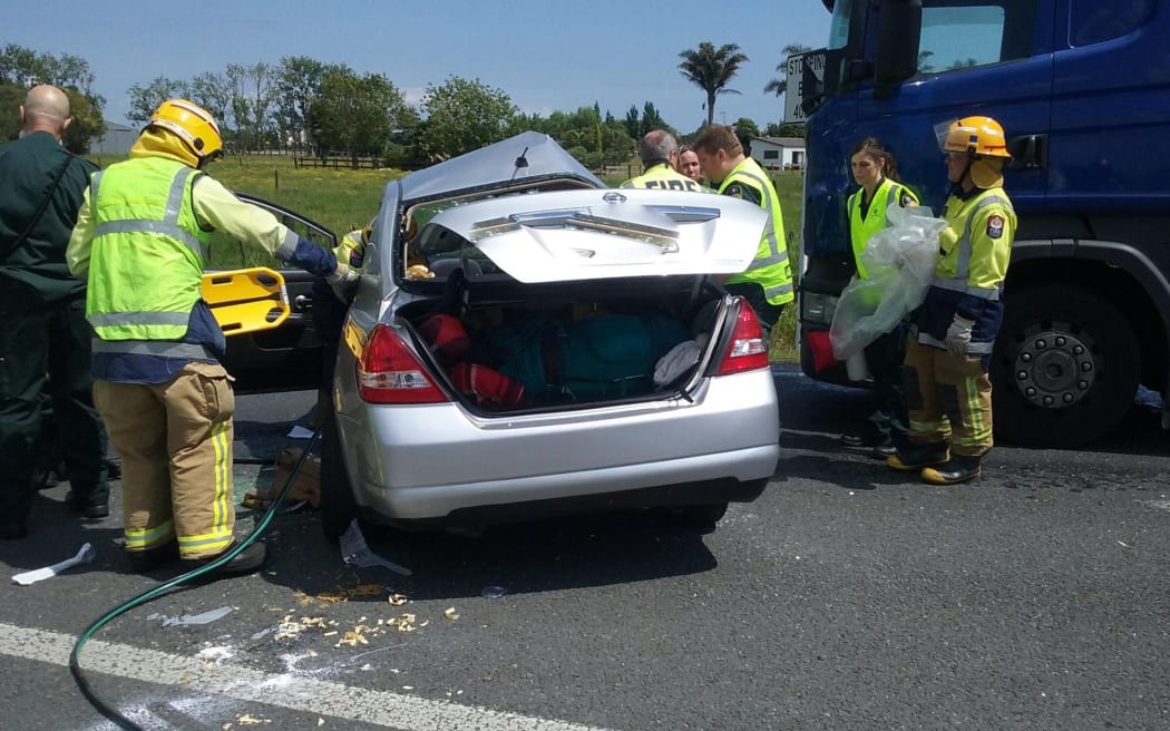 Emergency crews at the scene of the fatal crash in November.