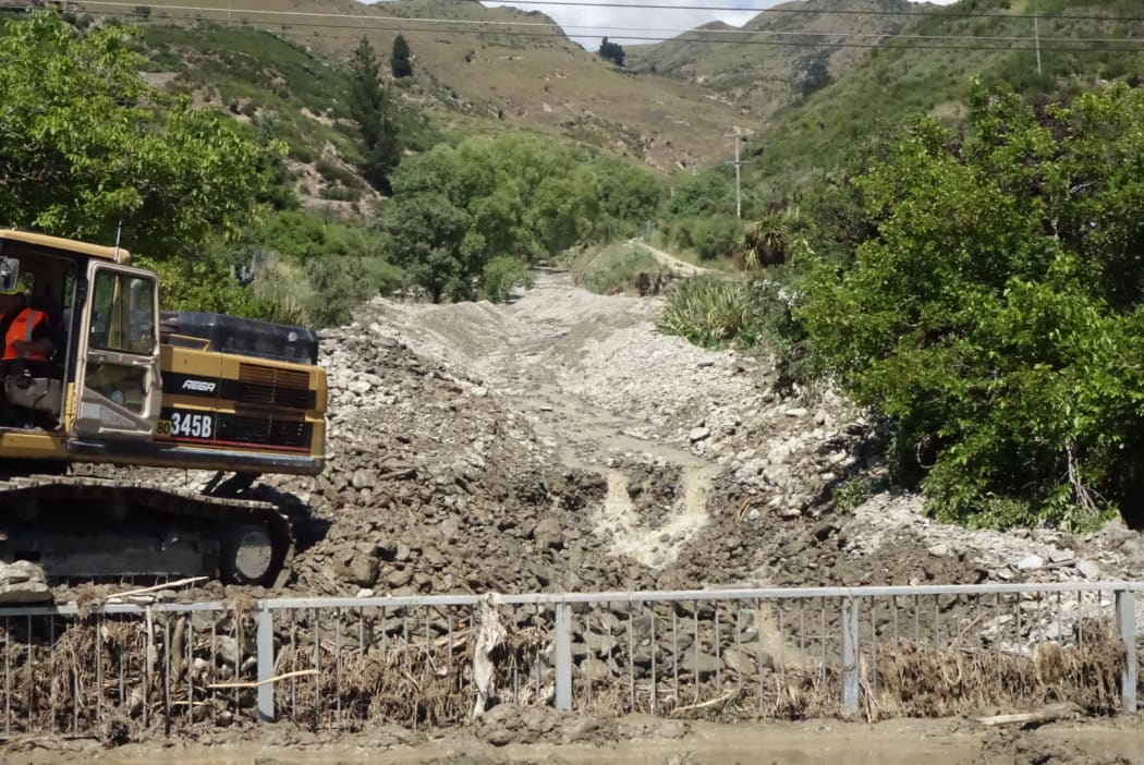 Rocks and debris blocked Reservoir Creek and a concrete culvert in Roxburgh