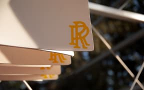 Oars bearhing the Rangi Ruru Girl's School's logo.