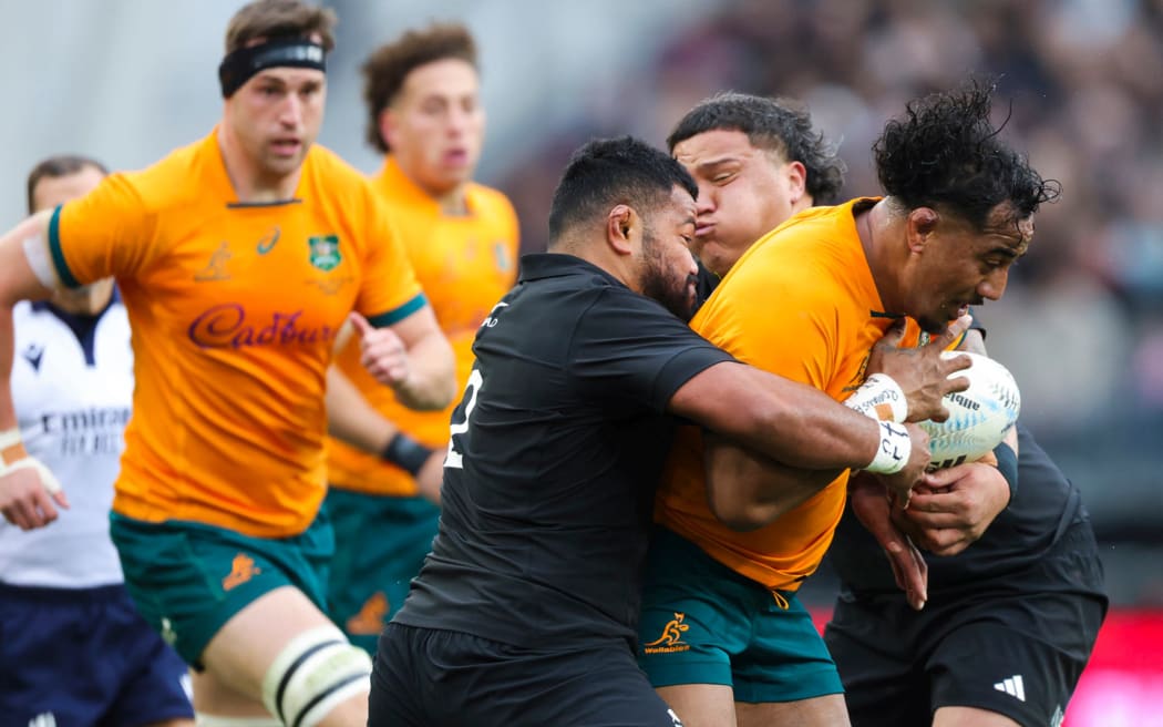 Wallabies prop Pone Fa'amausili on the burst against the All Blacks in the Bledisloe Cup test in Dunedin in 2023.