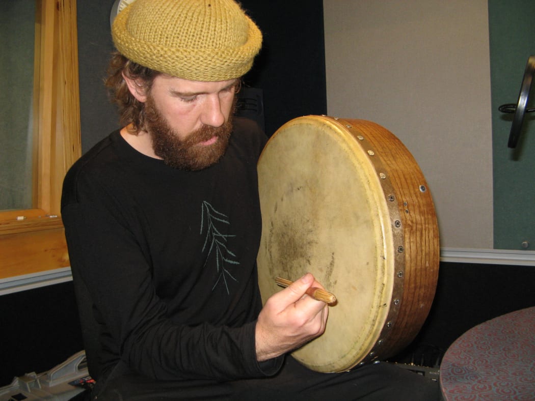 Chris O'Connor playing a bodhran