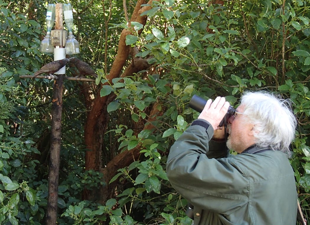 Bill Oddie taking a photo