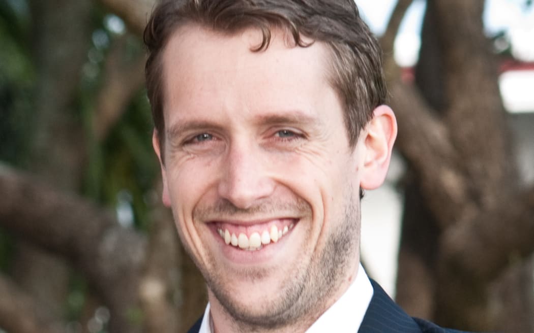 A portrait of Dan Weijers, smiling