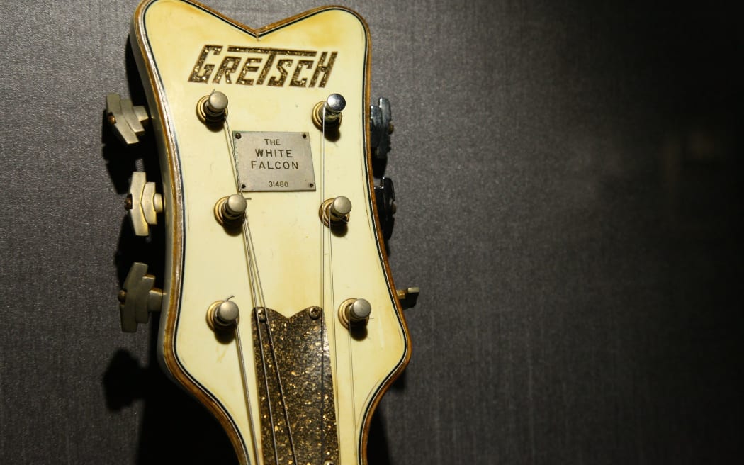 Malcolm Young of AC/DC's 1959 Gretsch White Falcon guitar is shown on display at Hard Rock Cafe's 40th anniversary Memorabilia Tour at Hard Rock Cafe, Times Square.