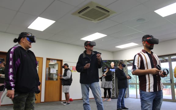 The virtual reality expo attendees are able to test potential employment through the headsets.