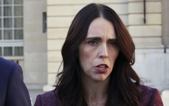 Prime Minister Jacinda Ardern speaks to media outside the OECD headquarters, in Paris on Tuesday.