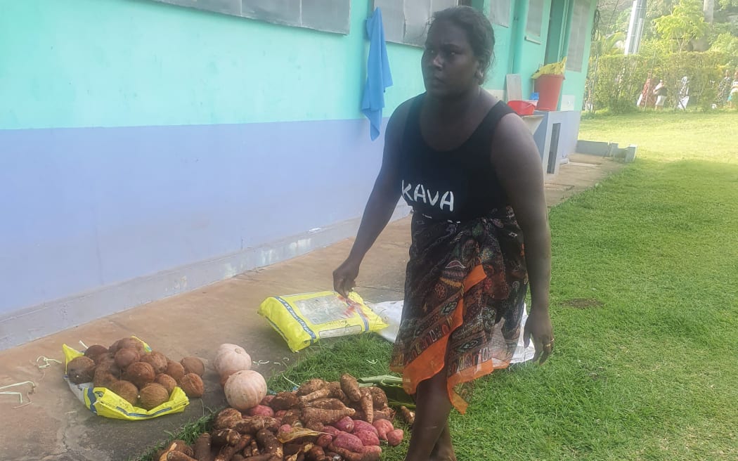 Members of a local church in Vanuatu take food supplies to stranded Solomon Islands nurses