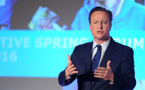 British Prime Minister, and leader of the Conservatives, David Cameron addresses delegates during the Conservative party Spring Forum in central London on 9 April, 2016.