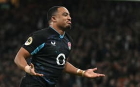 England's centre Max Ojomoh celebrates.