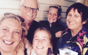 Jane McCarroll (left) with her parents and children, Charlie and Ella.