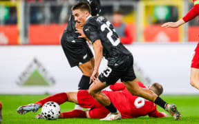 Ryan Thomas of New Zealand in action against Poland, 2025.