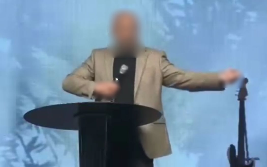 The worker speaking at Destiny Church.