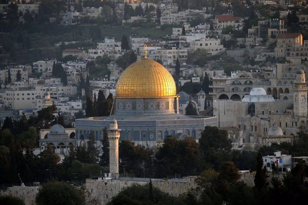 A picture taken on April 14, 2014 at the sunset shows the golden Dome of the Rock in the compound known to Muslims as al-Haram al-Sharif (Noble Sanctuary) and to Jews as the Temple Mount in Jerusalem's old city.