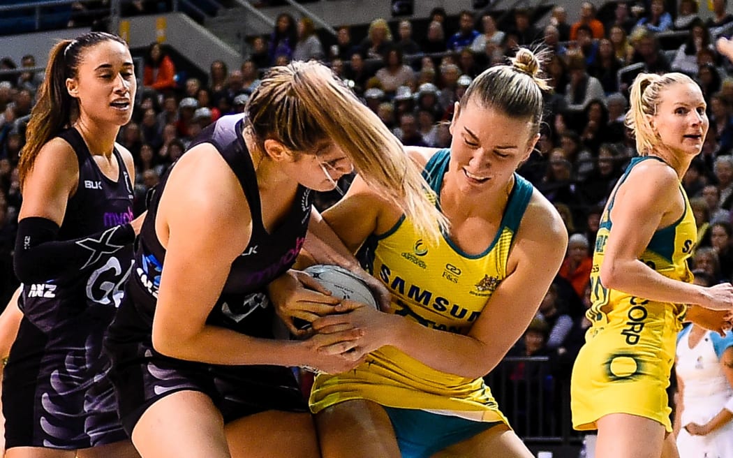 Te Paea Selby-Rickit of the Silver Ferns and Courtney Bruce of the Diamonds fight for the ball during the Constellation Cup 2017.