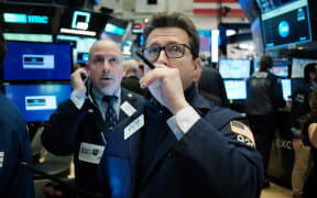 Traders work on the floor of the New York Stock Exchange on March 09, 2020.