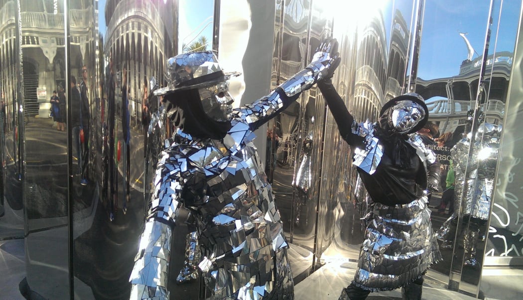 Mirror folk entertain the public at the opening of the Len Lye Centre in New Plymouth.