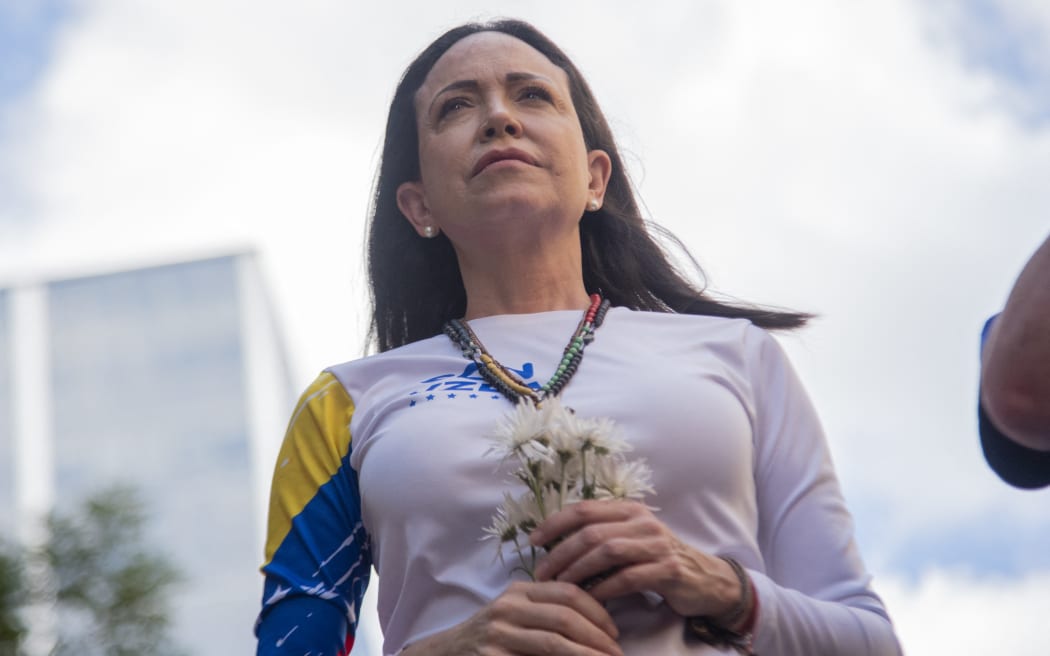 The Venezuelan opposition leader Maria Corina Machado attends a protest called by the opposition in Caracas, Venezuela, on January 9, 2025, one day before the presidential inauguration. Machado, who reappears publicly to lead the demonstrations against Nicolas Maduro's third term, is detained after being intercepted at the end of the gathering, according to her security team. (Photo by Jonathan Lanza/NurPhoto) (Photo by Jonathan Lanza / NurPhoto via AFP)