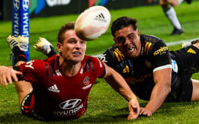 George Bridge of the Crusaders hits the ball dead  from Anton Lienert-Brown of the Chiefs come during the Super Rugby Aotearoa Final, Crusaders V Chiefs, at Orangetheory Stadium, Christchurch, New Zealand, 8th May 2021. Copyright photo: John Davidson / www.photosport.nz