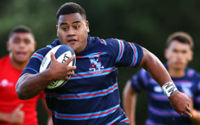 Daniel ( Taniela ) Tupou of Sacred Heart makes a break. Auckland Secondary Schools 1st XV rugby union match, Sacred Heart v Kelston Boys at Sacred Heart College, Auckland, New Zealand. Saturday 10th May 2014.