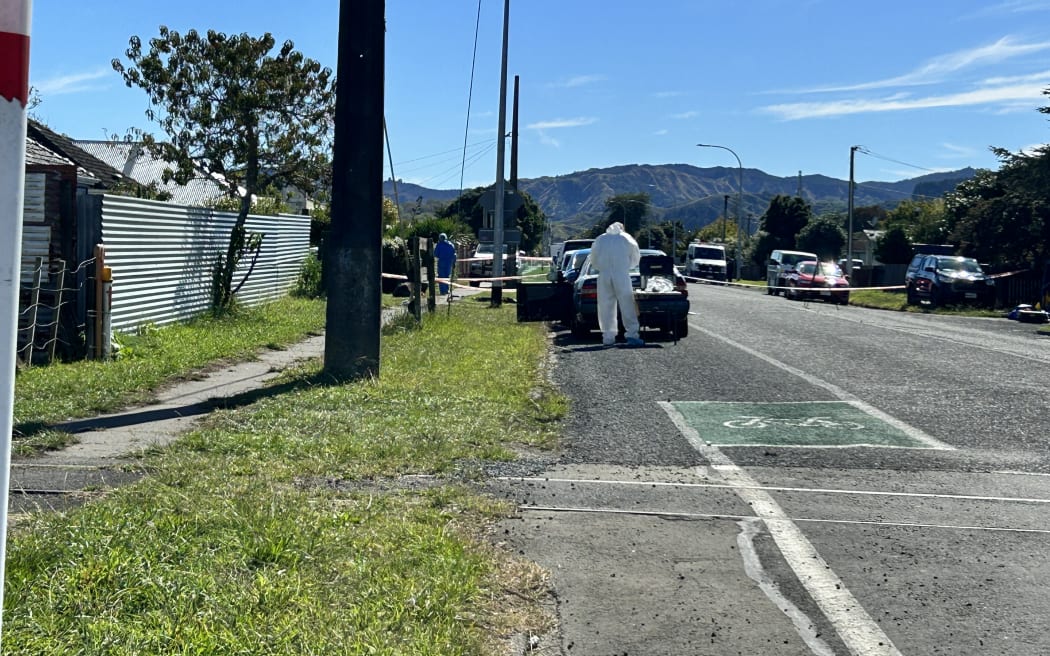Police at the scene of a brawl in Gisborne in which two people died and three were wounded.