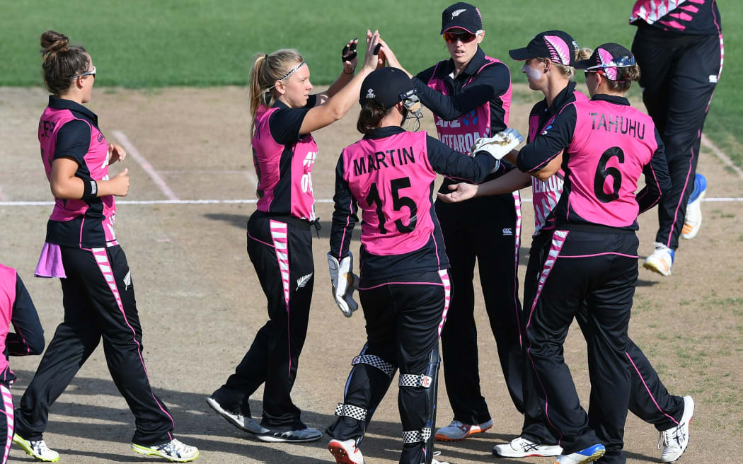 White Ferns players celebrate the wicket of Punia.
New Zealand White Ferns v India. Women's Twenty20 International cricket. 3rd T20. Seddon Park, Hamilton, New Zealand. Sunday 10 February 2019.  © Copyright photo: Andrew Cornaga / www.photosport.nz