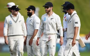 The Black Caps wander off the Basin Reserve after a long day in the field.