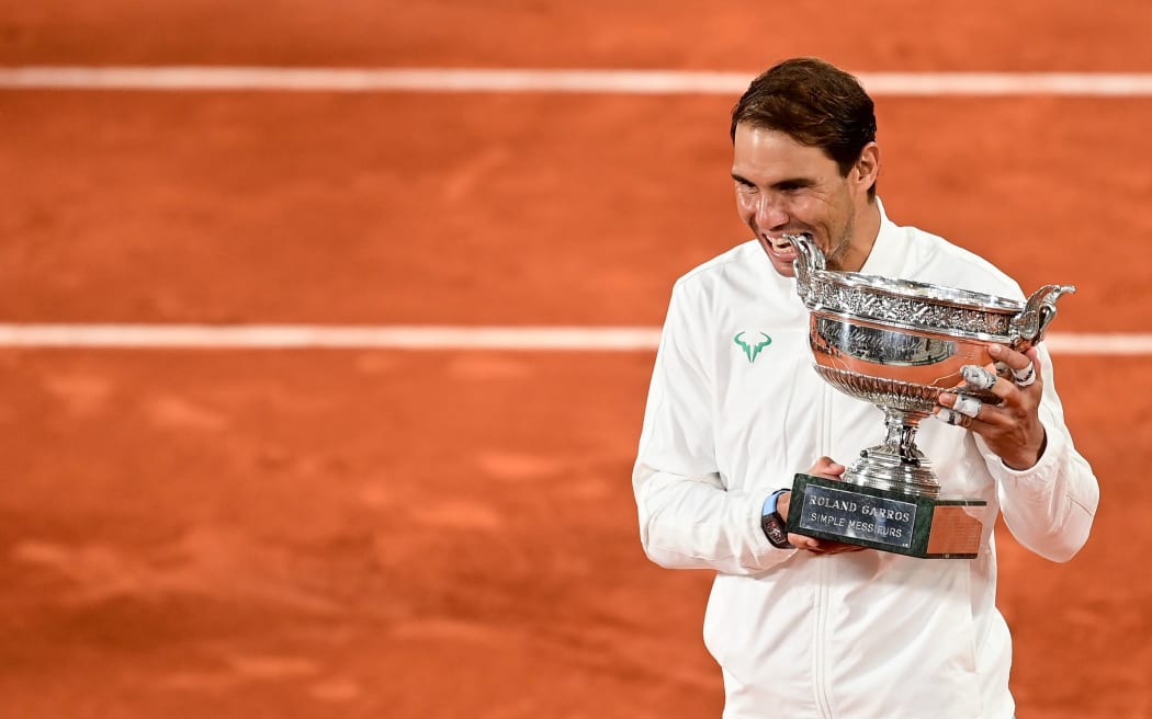 Rafael Nadal celebrates winning the men's singles final of the Roland Garros French Tennis Open 2020.