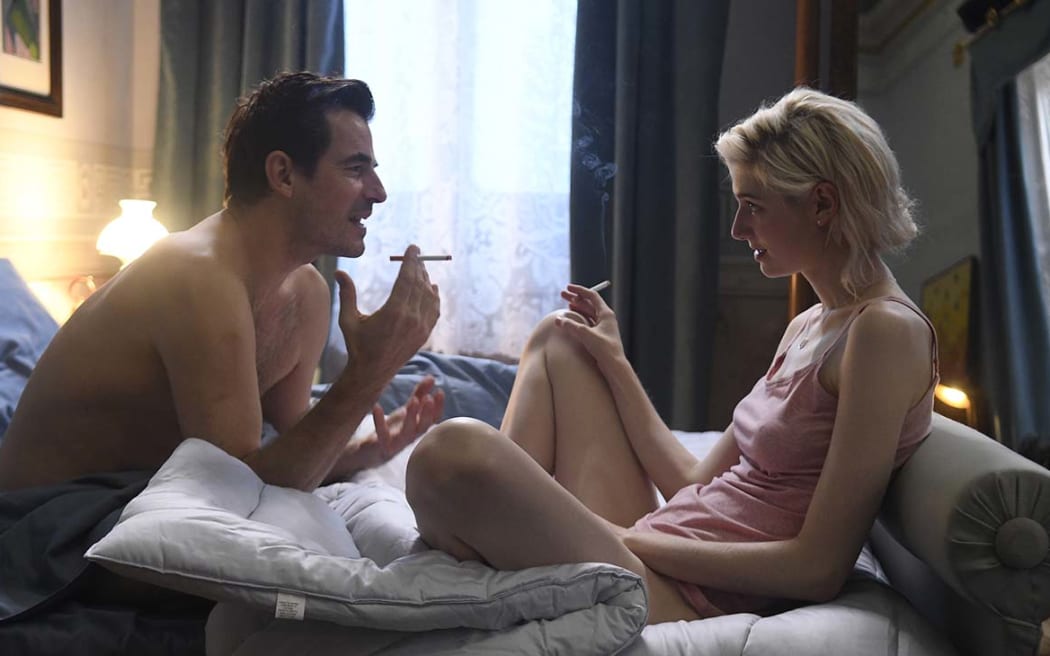 A still from the 2019 film Burnt Orange Heresy