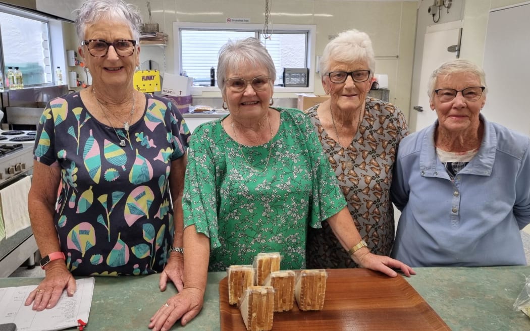 Barbara Batley, second left, was in charge of the team running the kitchen at Paritūtū.
