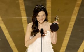 HOLLYWOOD, CALIFORNIA - MARCH 12: Michelle Yeoh accepts the Best Actress award for "Everything Everywhere All at Once" onstage during the 95th Annual Academy Awards at Dolby Theatre on March 12, 2023 in Hollywood, California.   Kevin Winter/Getty Images/AFP (Photo by KEVIN WINTER / GETTY IMAGES NORTH AMERICA / Getty Images via AFP)