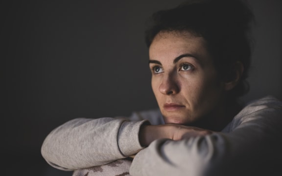 Tired looking woman