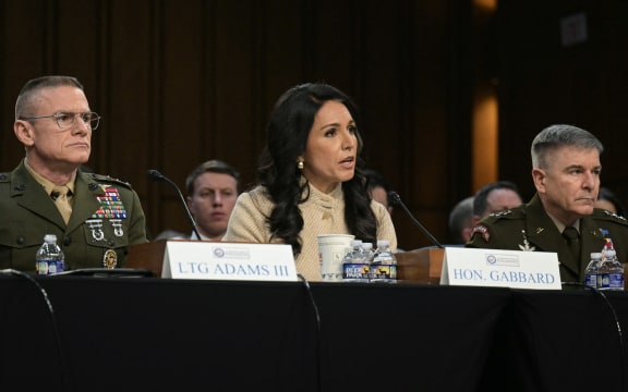 (L/R) Director of Defense Intelligence Agency (DIA) James Adams III, US Director of National Intelligence Tulsi Gabbard, and Acting Commander of US Cyber Command William Hartman testify during a Senate Committee on Intelligence hearing to examine worldwide threats, on Capitol Hill in Washington, DC, on March 18, 2026. (Photo by Oliver Contreras / AFP)