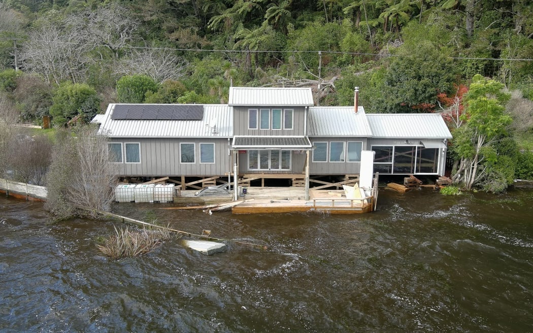 The level of Lake Rotoehu has risen to a point where lakeside homes, including the Blairs', are being flooded. Photo / Andrew Warner