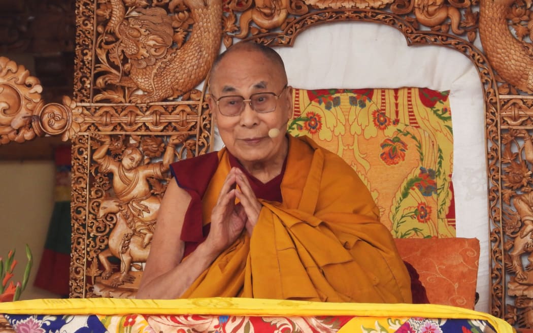 Tibetan spiritual leader Dalai Lama gestures a he leads a teachings gathering in Leh on July 28, 2022. (Photo by Mohd Arhaan ARCHER / AFP)