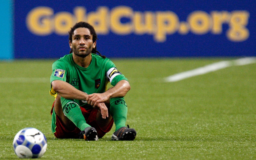 ARLINGTON, TX - JULY 19: Midfielder Stephane Auvray #8 of Guadeloupe sits on the field after a 5-1 loss to Costa Rica during the CONCACAF Gold Cup Quarterfinals at Dallas Cowboys Stadium on July 19, 2009 in Arlington, Texas.   Ronald Martinez/Getty Images/AFP (Photo by RONALD MARTINEZ / GETTY IMAGES NORTH AMERICA / Getty Images via AFP)