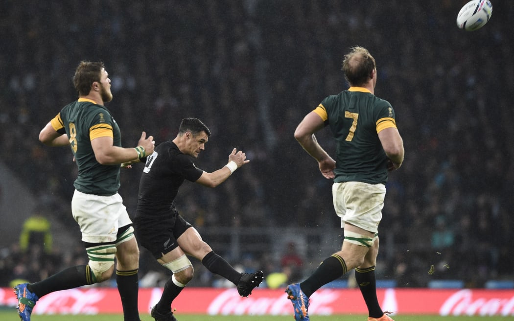 Dan Carter slots a drop goal during the semi-final