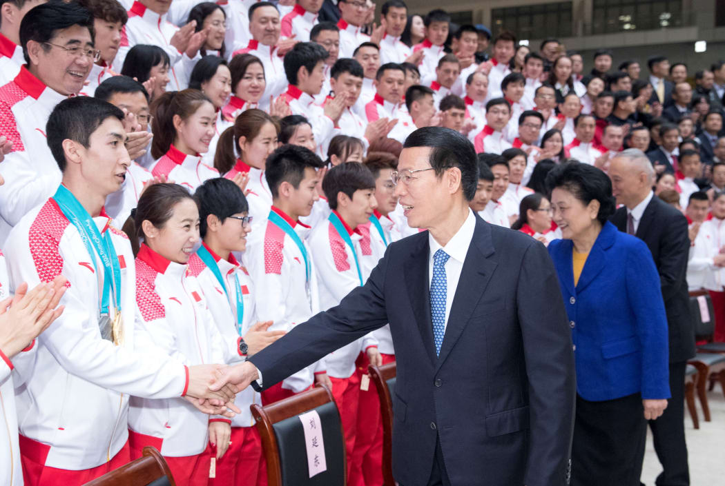 (180227) -- BEIJING, Feb. 27, 2018 (Xinhua) -- Chinese Vice Premier Zhang Gaoli meets with the Chinese delegation that returned home after the PyeongChang Winter Olympics, in Beijing, capital of China, Feb. 27, 2018.