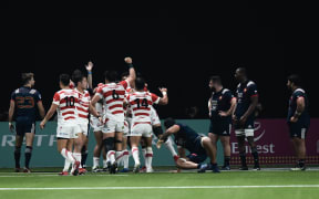Japan celebrate a try.