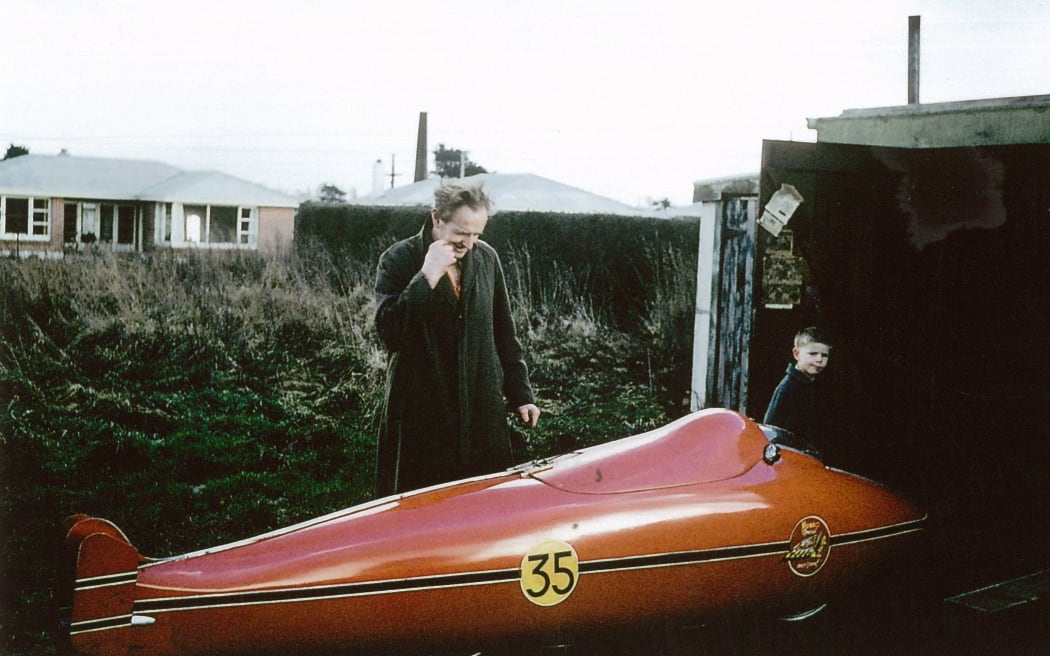 Burt Munro in Invercargill in 1962 preparing to pack up the Indian inside it’s Streamliner to send to Bonneville. Also pictured: a young Neville Hayes, now the Managing Director of E Hayes and Sons Invercargill, and the owner of Burt’s Indian