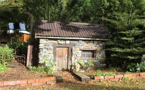 The village is home to some unique structures, including this miniature stone cottage.