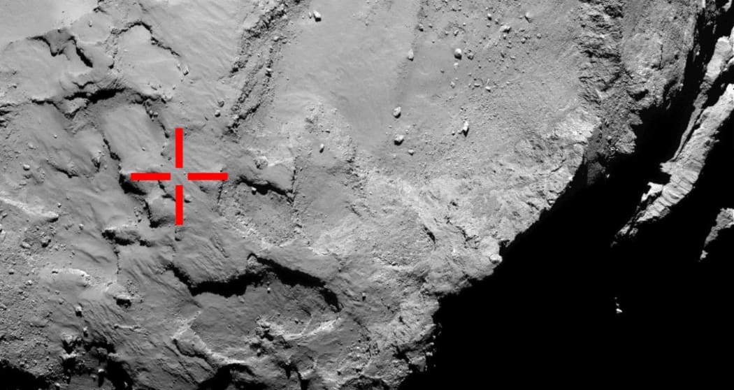 This image marks the first touchdown point of the lander - before it bounced twice, settling in the shadow of a large cliff.