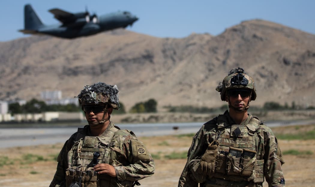 U.S soldiers from the XVIII Airborne Corps in  position guarding the at Hamid Karzai International Airport in Kabul, Afghanistan, on Aug 27, 2021.