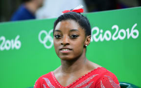 US gymnast Simone Biles attends a practice session of the women's Artistic gymnastics at the Olympic Arena on August 4, 2016 ahead of the Rio 2016 Olympic Games in Rio de Janeiro.